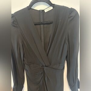 Sandro small black dress. Midi length (depending on how tall you are)